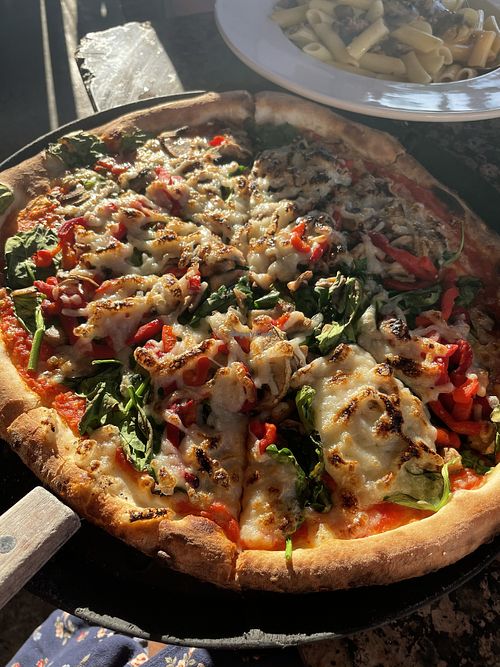 Pizza! They added spinach peppers and mushrooms 😎 at Made in Italy in Venice