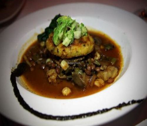 Roasted Corn Masa Cake: pozole rojo with caramelized fennel, pinquito beans, tomato confit and exotic mushrooms, seared kale... at Millennium in Oakland