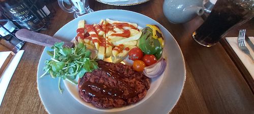 Vegan beetroot steak! Description reads it has bbq sauce but mine came dry. However they did have bbq sauce on the table! Very yummy plate. at High Park in Huddersfield