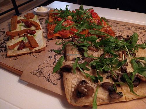 De karmakebabpizza, de bolognaisepizza en pizza met paddenstoelen en truffelsaus at SUGO - Pizza al Taglio in Utrecht