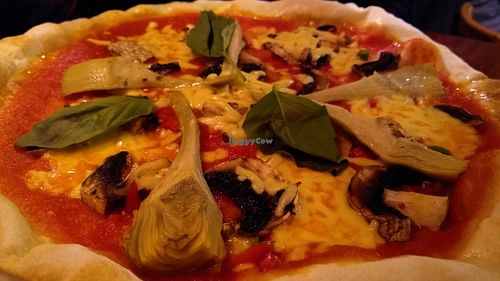 Marinara pizza with mushrooms, artichokes & vegan cheese at The Square Orange in Keswick