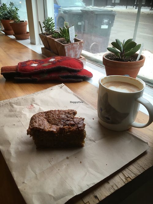Vegan cake and an oat milk latte. The perfect antidote to a chilly Winnipeg morning! at Eadha Bakery Worker Co-op in Winnipeg