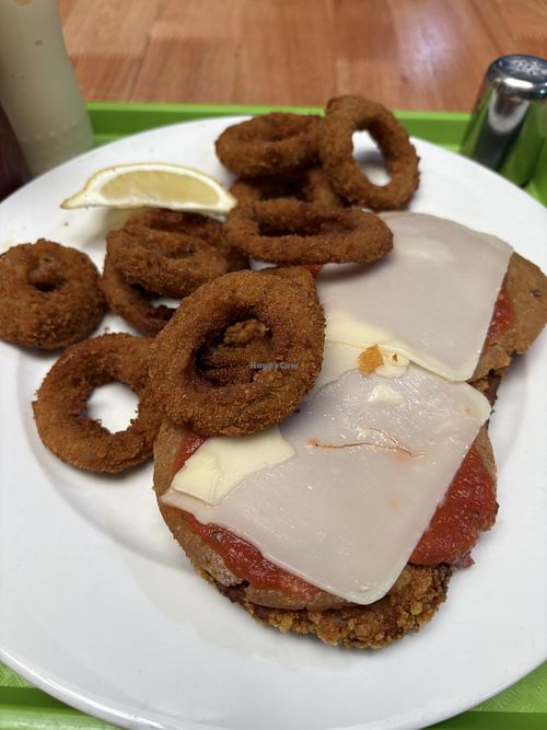 Milanesa napolitana con aros cebolla   at Guacamole in Montevideo