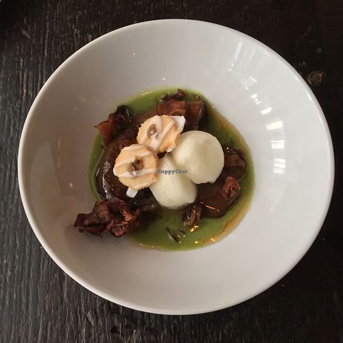 Veggies for dessert! Eggplants Foster cooked tableside with basil sauce, lemon ice, and eggplant thumbprint cookies.  at Dirt Candy in New York City