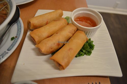 Fresh fried spring rolls (appetizers) with sauce at Vegetarian House in San Jose