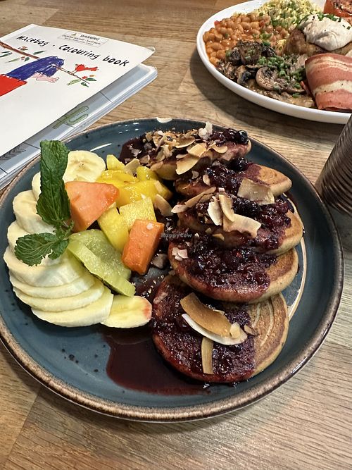 Fresh fruit compote pancakes  at Eqvilibrivm Cafe in Barcelona