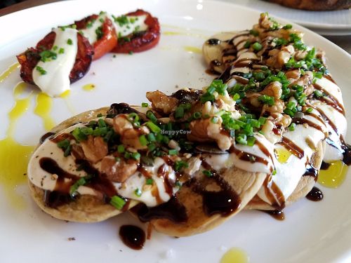 Savory buckwheat pancakes with cream cheese at Eqvilibrivm Cafe in Barcelona