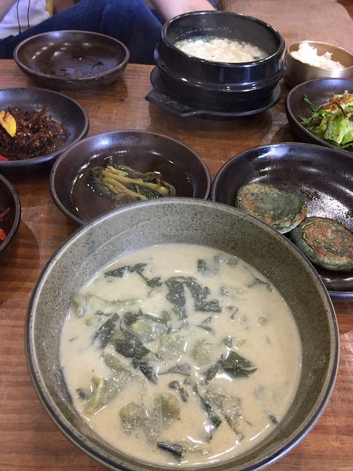 Perilla seed sujebi in the front, soft tofu soup in the back at Babiboyak in Jeju