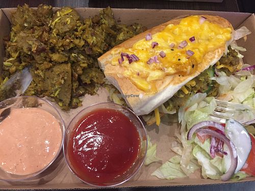 Seitan based sandwich (that peach colored sauce is heaven!!) at Vegan Kiraly in Budapest