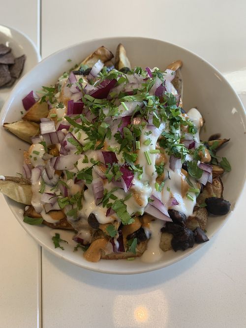 Off menu item - fully loaded (oil-free air fried) fries! at Slice of Life in Sebastopol