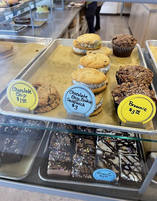 Vegan yellow sticker goods  at Happy Bellies Bake Shop in Appleton