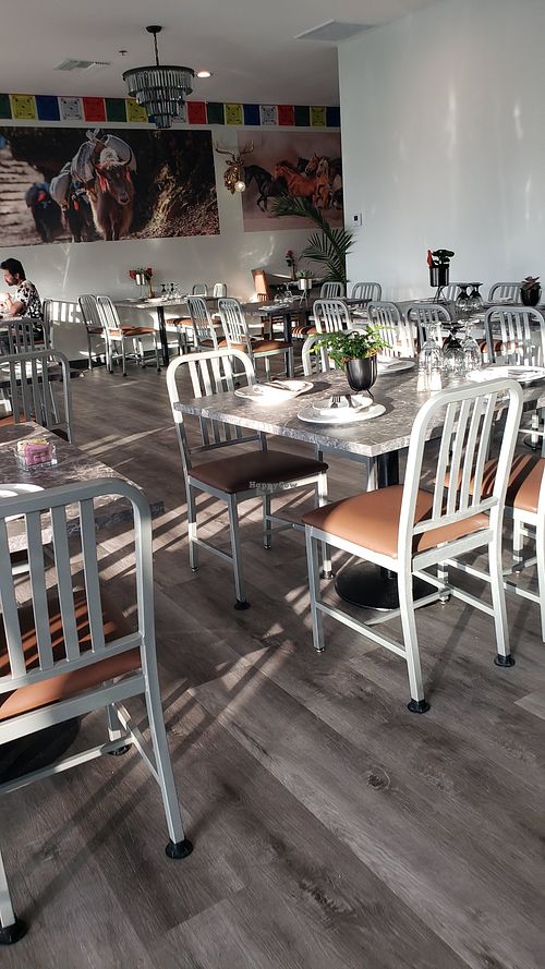 Indoor seating with view of marina at Himalayan Grill in Huntington Beach