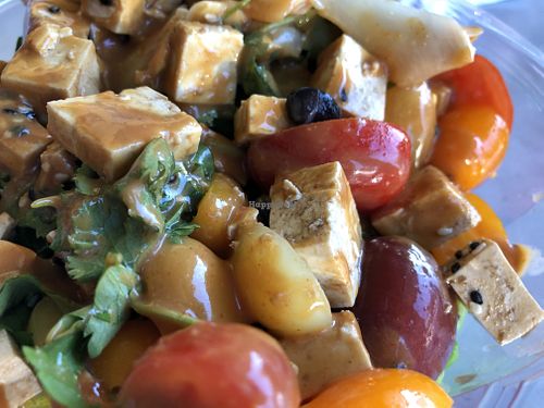 Cold uncooked tofu, drenched in Thai peanut sauce at Spoondrift in Sanibel