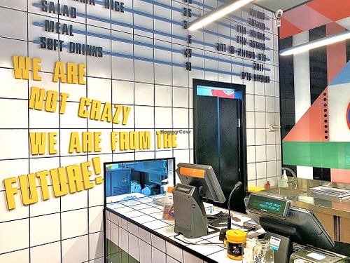 “We are not crazy, we are from the future” sign at the Green Butcher, Tel Aviv at The Green Butcher in Tel Aviv