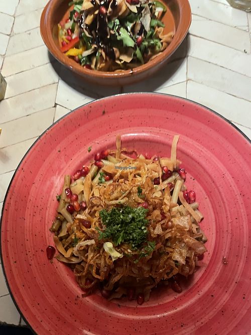 Garlic pasta with fried onions and lentils + fatouch of fresh vegetables and sumac fried pitas  at Naranj in Marrakech