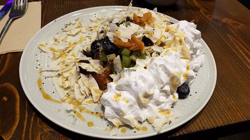 Delicious waffle with whipped cream at Wholywood in Paris