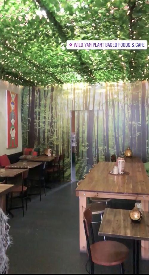 Indoor seating area at Wild Yam Health Foods and Cafe in Mordialloc