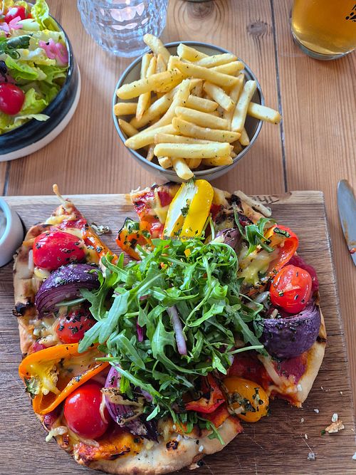 Fresh veg and salad on a great pizza. at The Duck in Ryde