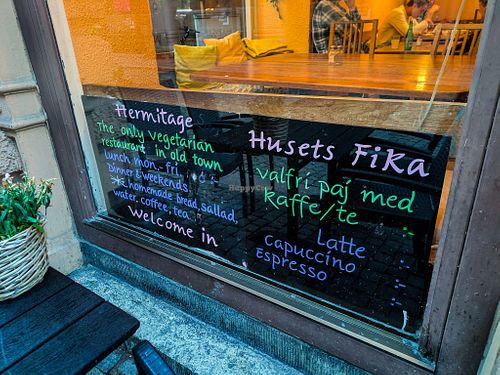 Sign facing out of front window at Hermitage at Hermitage in Stockholm