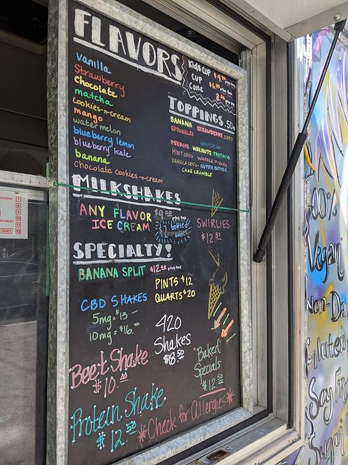 Menu board at Earthy Goodness in Houston