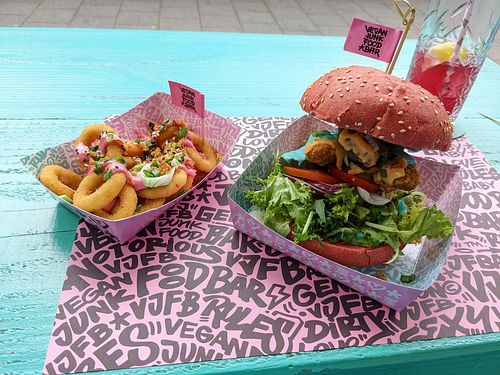 Onion rings, Daddy burger (imitates a chicken sandwich) at Vegan Junk Food Bar  - Rotterdam in Rotterdam