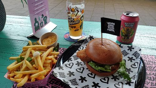 Fish burger and beer at Vegan Junk Food Bar  - Rotterdam in Rotterdam