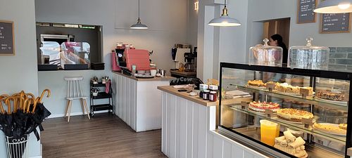 Entrée. Large room with tables beside the corner. at Mit Herz und Zucker in Hamburg