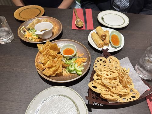 gyoza, wontons, spring rolls, and lotus root crisps  at Suissi Vegan Kitchen  in Glasgow