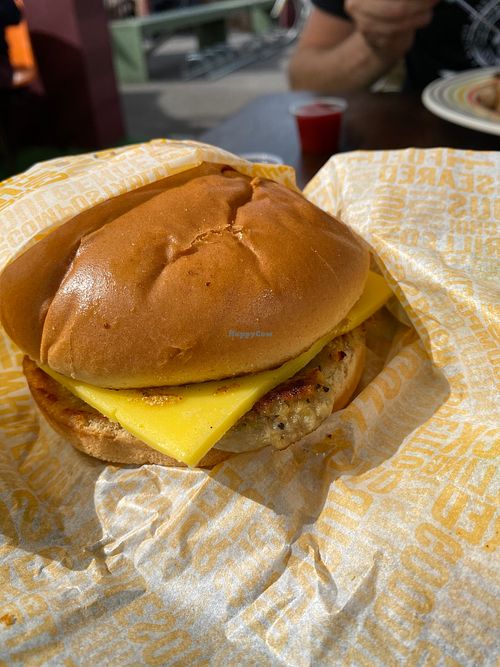 Vegan muffin with sausage, tofu and vegan cheese. at Rooted in Bath