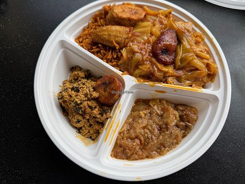 Vegan platter with cabbage, egusi soup, eggplant, plantains and jollof rice at Mary's African Cuisine in Halifax