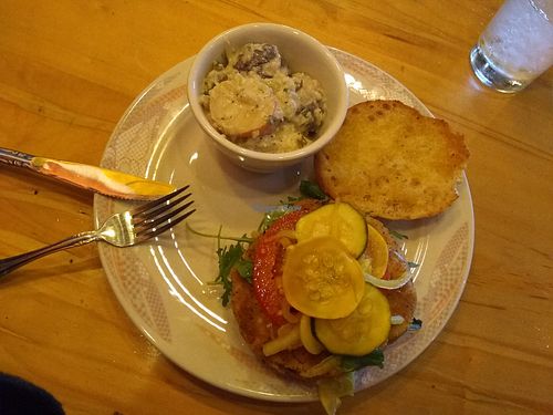 Delicious "crab" sandwich on gluten free bun with side of potato salad. at So Radish in Arvada