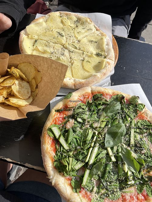 Helsinki Pizza (green), Nairobi Pizza (potatoes), and house made potato chips   at POW - The Vegan Pizzeria in Copenhagen