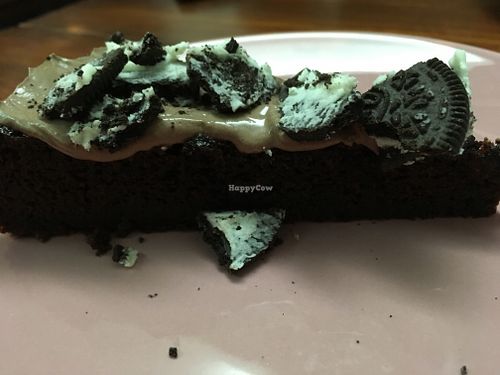 Chocolate cake with Oreo on top at Vegan Junkies in Lisbon