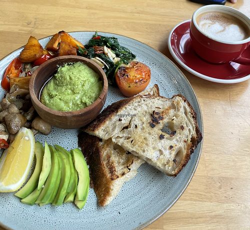 Super vegan breakfast and flat white with oat milk   at Canvas Cafe in Sanur