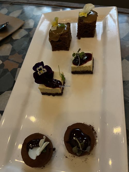 Desserts- passion fruit cheesecake, chocolate rum petit four and sticky date pudding (banquet fourth course)   at Yulli's in Surry Hills