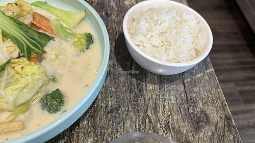 Rice served separately with the yellow curry.  at West End Vegan Restaurant in West End