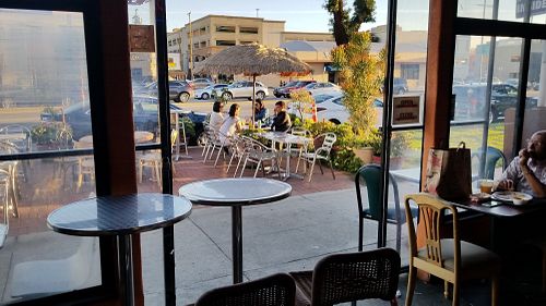 Indoor and outdoor seating areas at India Sweets and Spices in Culver City