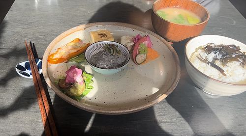 Miso soup, rice, jelly tofu, stuffed bell pepper (with some form of cheese), picked vegetables   at Lorimer in Kyoto