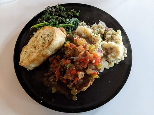 Smashed potatoes, kale, breaded chicken with creole gravy. A bit too salty. Not that I wouldn't get it again.  at Vegan Food House in Dallas