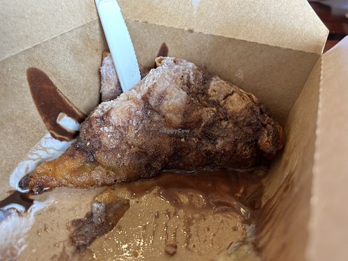Beignets with chocolate and cream cheese drizzle  - so good!   at Vegan Food House in Dallas