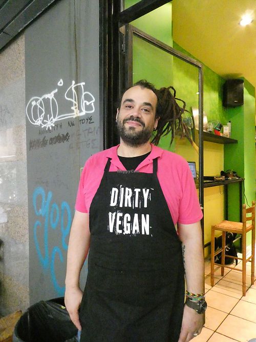 The friendly owner at Roots Foods and Culture in Athens