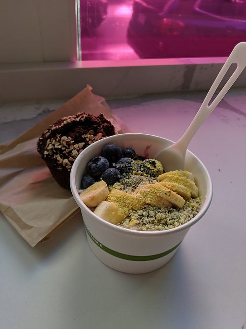 Vegan muffin and steel cut oats with toppings at MIGHTY LOVE FOOD in Boston