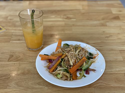 Fresh orange juice and pad thai  at Loving Vegan in Da Nang