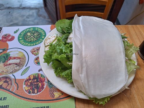 Herbs and rice paper that cones with the omelette at Loving Vegan in Da Nang