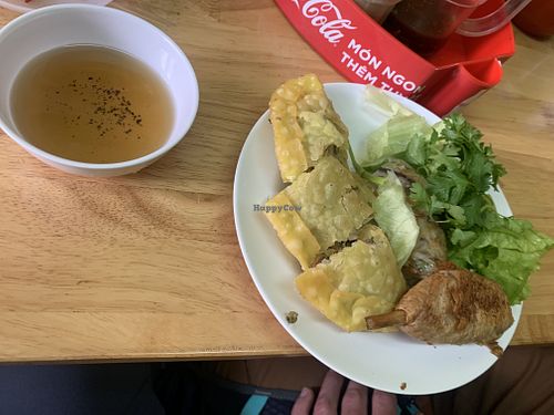 Lemongrass thigh, pillow cake, and spring roll (already ate some of the spring roll though) at Pho Chay in Hanoi
