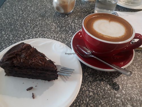 Vegan chocolate cake and large soy latte at Bacan Cafe in Vientiane