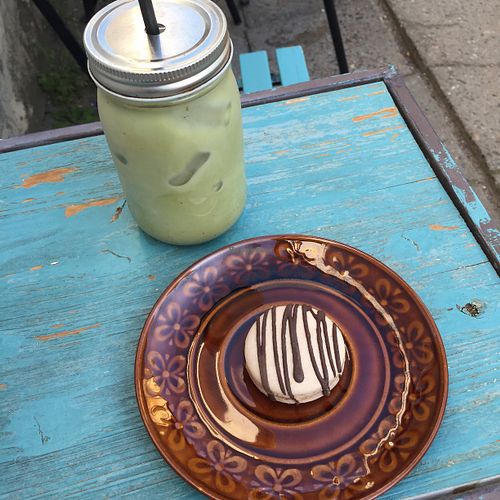 Really tasty macaron and matcha latte with oat milk! at Lisanna - Vegan Coffee Shop in Tallinn