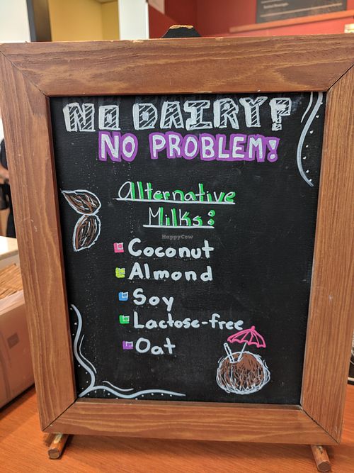 Advertising for (mostly) non-dairy milks! Oat milk is new as of May 2019 :) at Good Earth Coffeehouse - Taylor Family Digital Library in Calgary