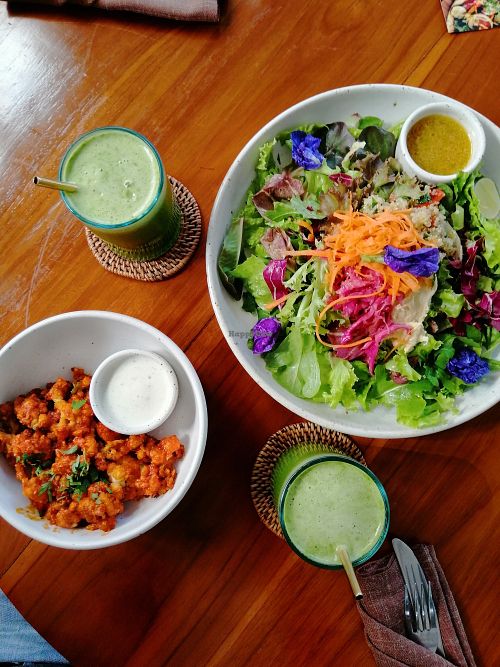 Buffalo cauliflower with ranch. Salad and green juices at Bella by Sage in Ubud