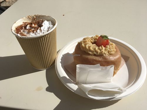 Pumpkin and spice coffee and a peanut butter and jelly donut. at Scoop 'n Dough in Lisbon